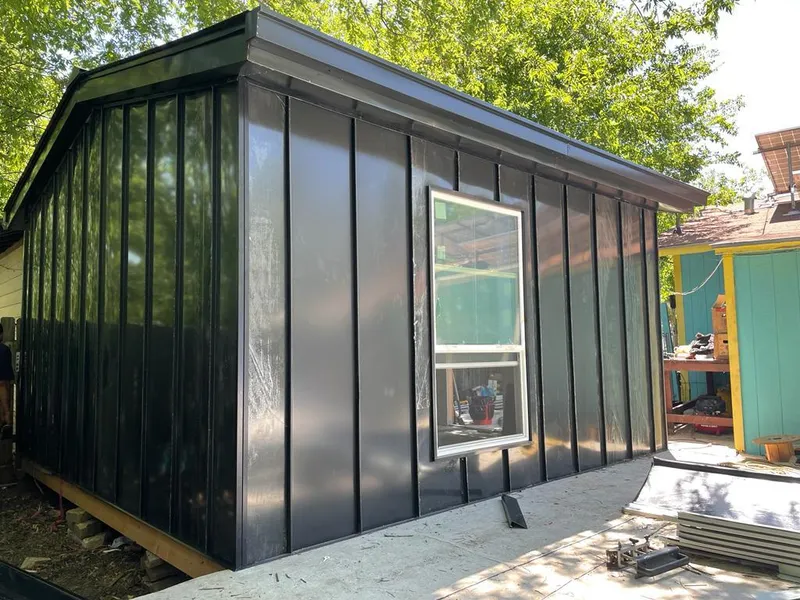 Black standing seam metal wall panels for Roof Inspection in White Hall